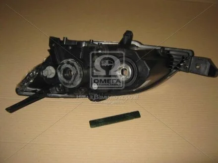Фара пра. MAZDA 3 HB 04-  TYC 20A859052B